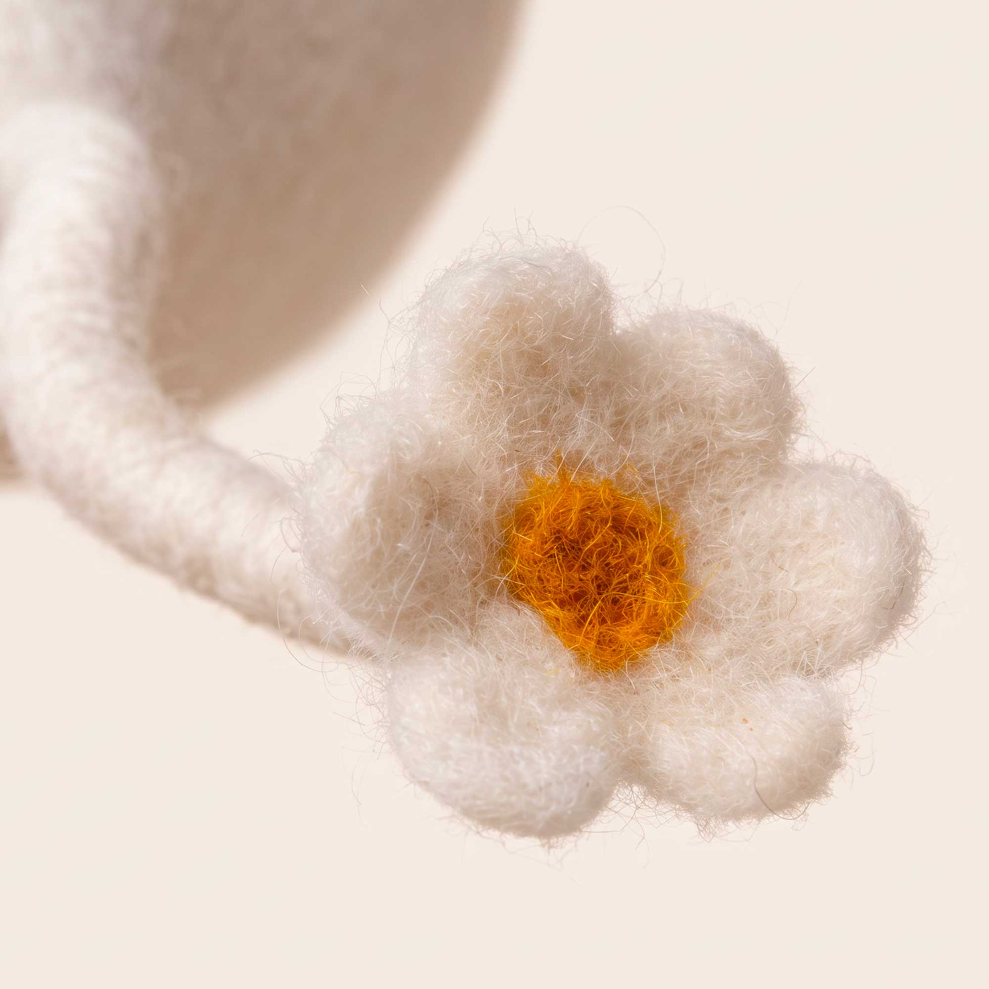 Drop Daisy wool cat cave with daisy-shaped detail