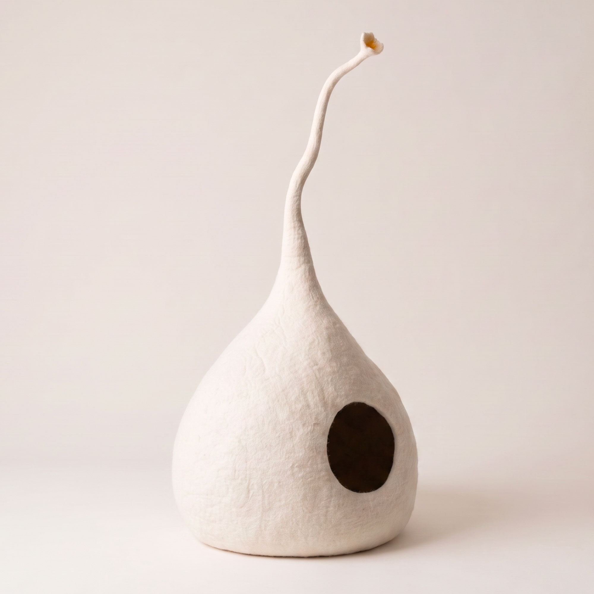 Drop Daisy wool cat cave with daisy-shaped tail